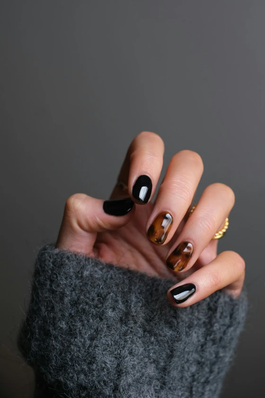 Glossy manicure with a dark polish